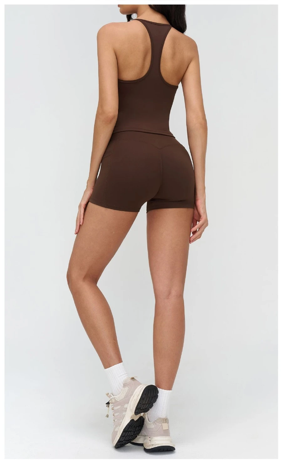 Women's racerback workout tank top highlighting open back design-coffee brown