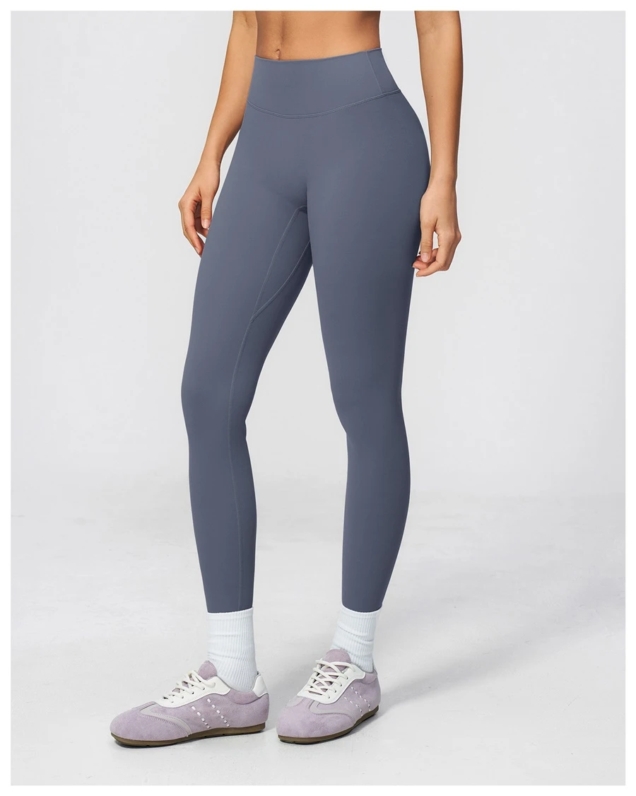 side view for Women's seamless front workout leggings made from buttery soft nylon spandex fabric-misty blue