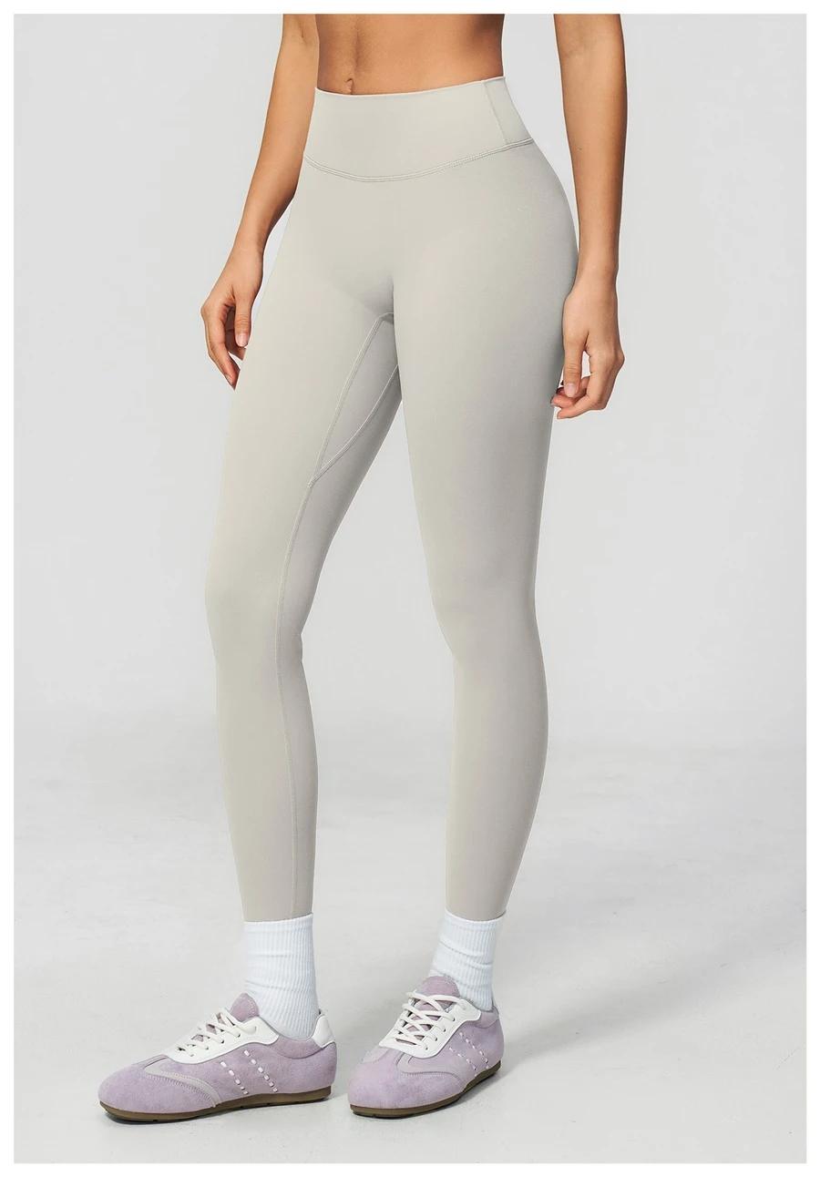 side view for Women's seamless front workout leggings made from buttery soft nylon spandex fabric-pear grey