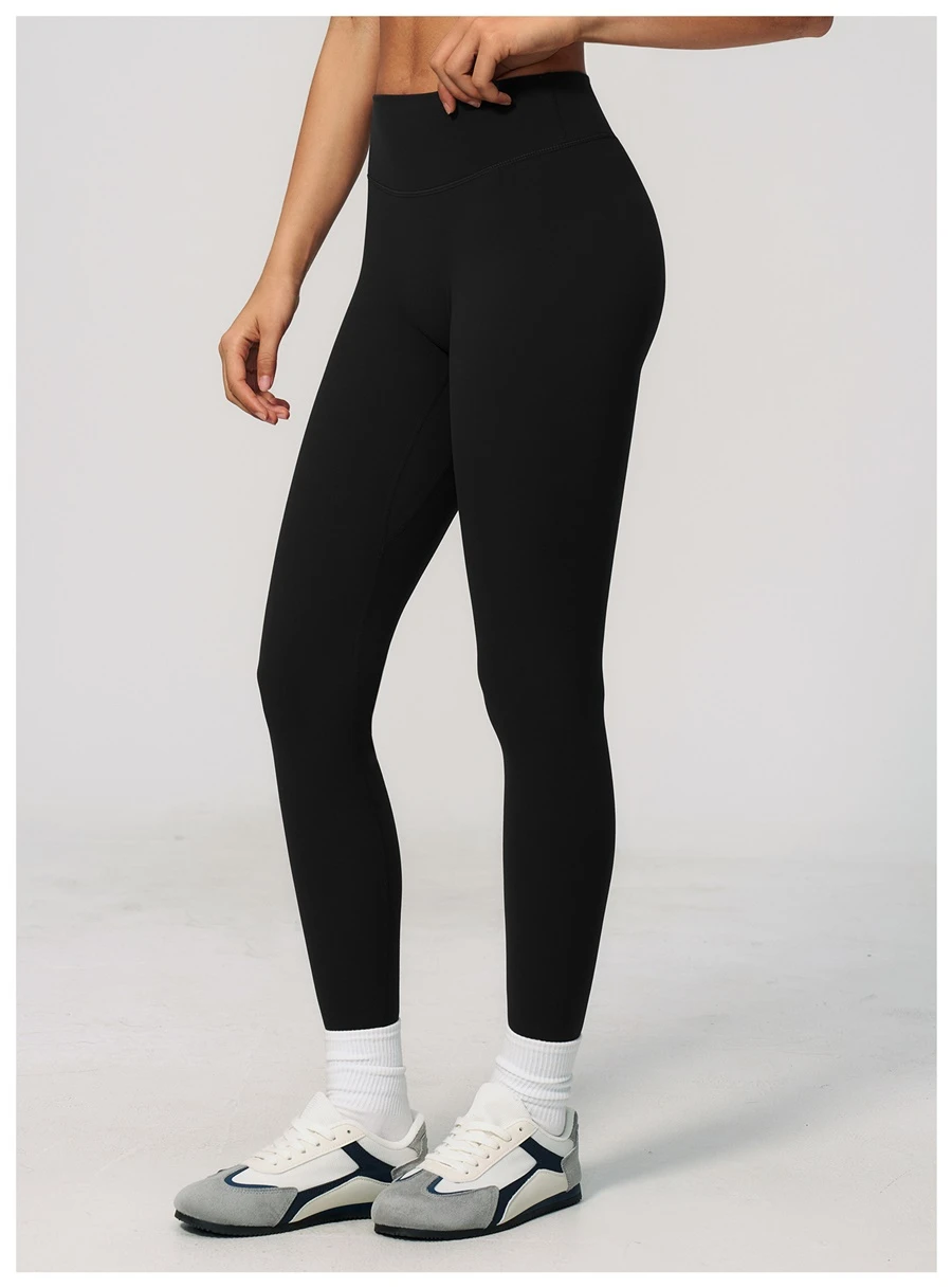 side view for Women's seamless front workout leggings made from buttery soft nylon spandex fabric-black
