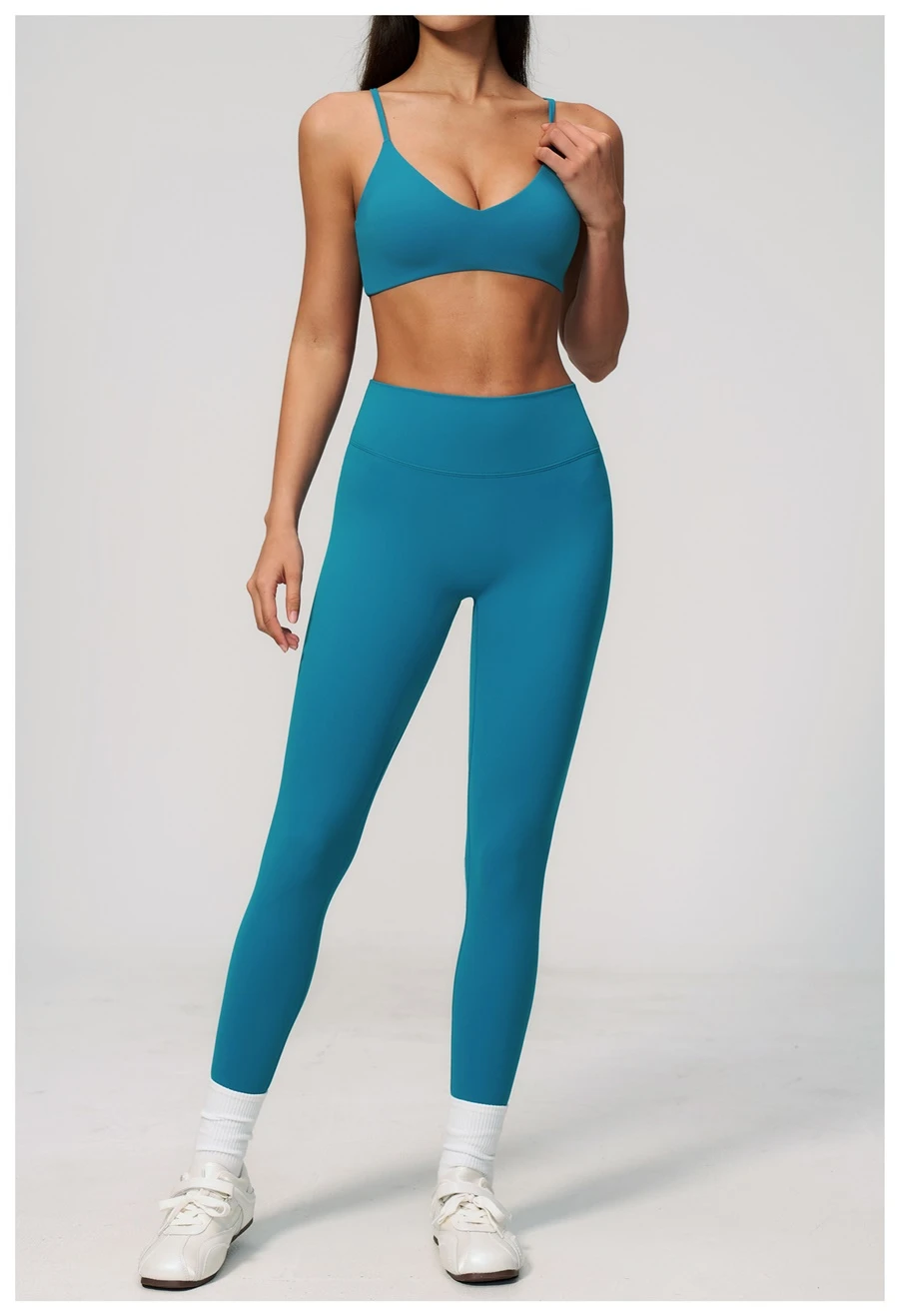 Women's seamless front workout leggings made from buttery soft nylon spandex fabric-peacock blue