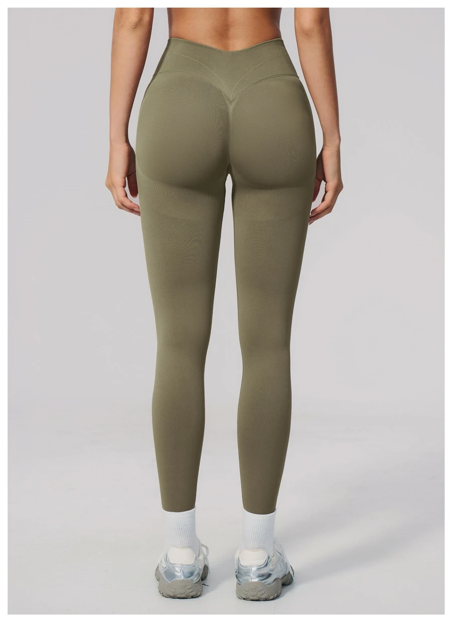 Booty lifting yoga leggings featuring sculpting contour seams-pine green