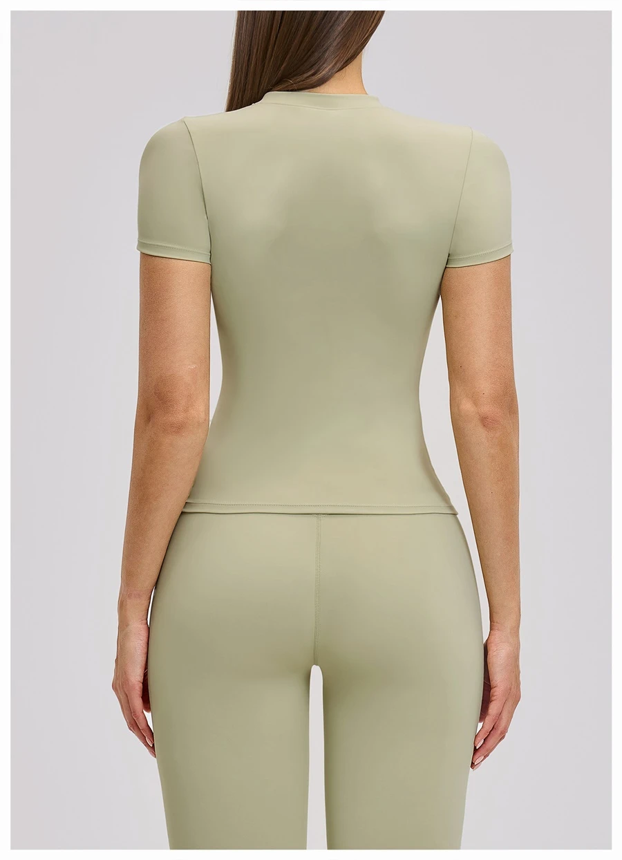 Women’s quick-dry yoga short sleeve tee in brushed nylon-spandex, slim-fit activewear top with classic crew neck and extended hem-green-back view