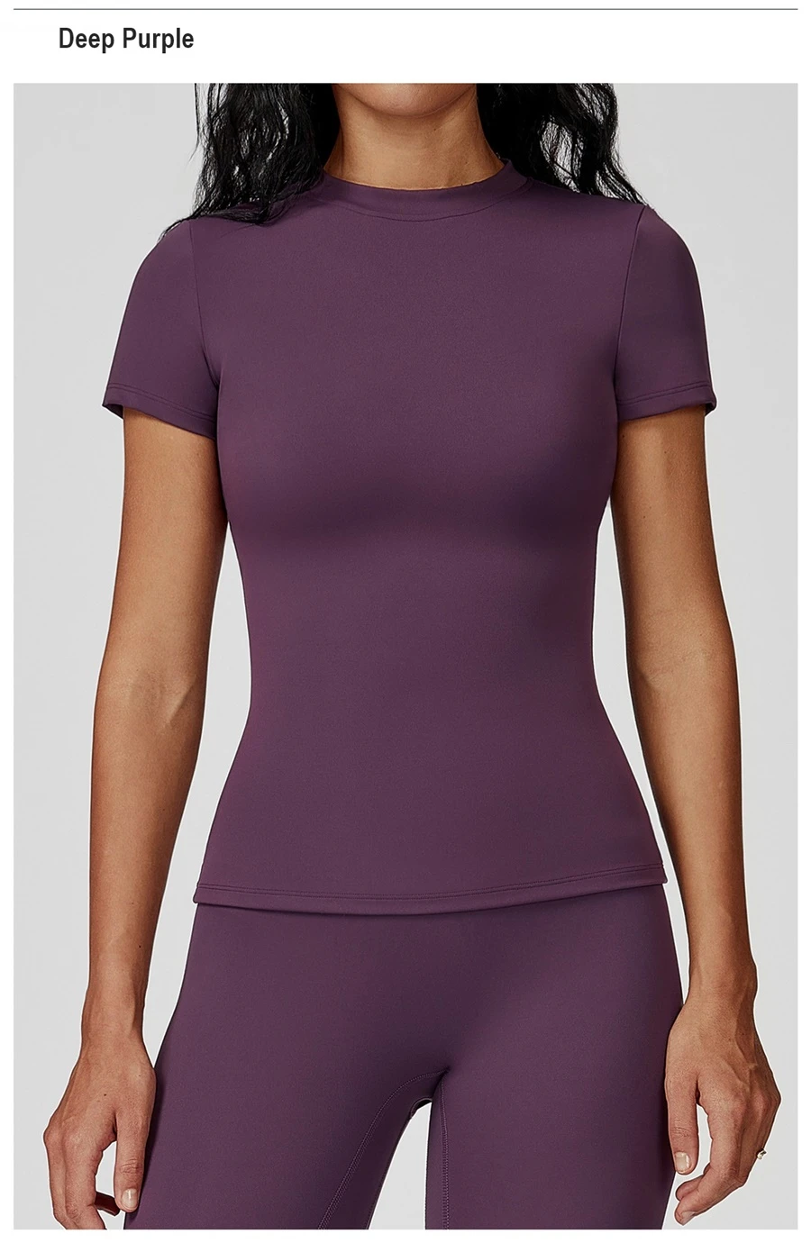 Women’s quick-dry yoga short sleeve tee in brushed nylon-spandex, slim-fit activewear top with classic crew neck and extended hem-deep purple front