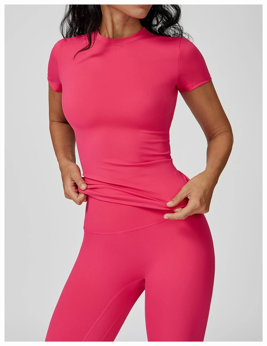 Women’s quick-dry yoga short sleeve tee in brushed nylon-spandex, slim-fit activewear top with classic crew neck and extended hem