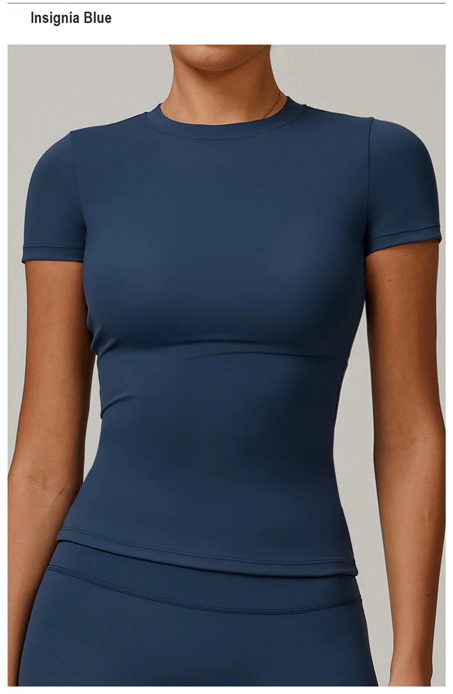Women’s quick-dry yoga short sleeve tee in brushed nylon-spandex, slim-fit activewear top with classic crew neck and extended hem-blue