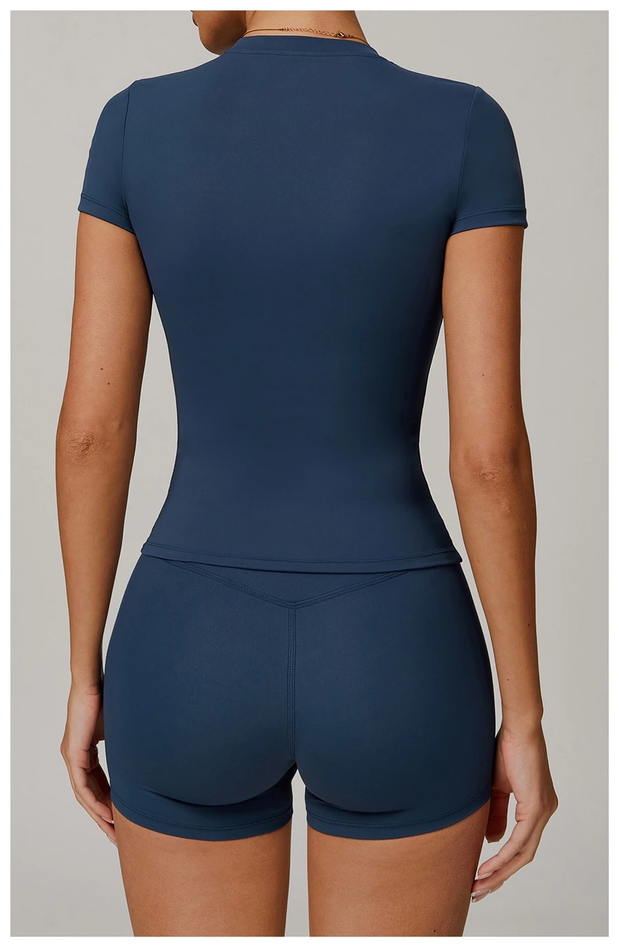 Women’s quick-dry yoga short sleeve tee in brushed nylon-spandex, slim-fit activewear top with classic crew neck and extended hem-blue back