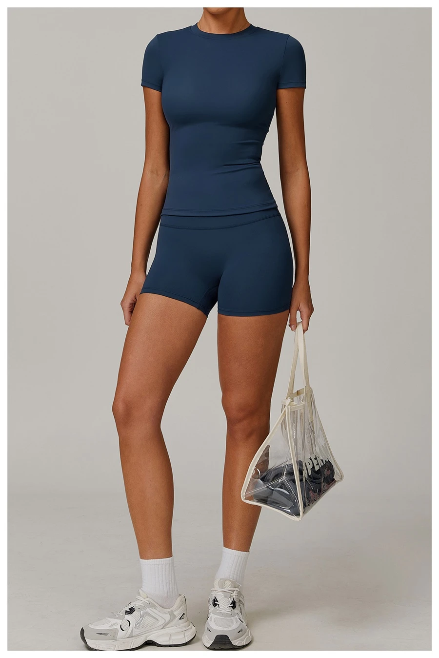 Women’s quick-dry yoga short sleeve tee in brushed nylon-spandex, slim-fit activewear top with classic crew neck and extended hem-blue