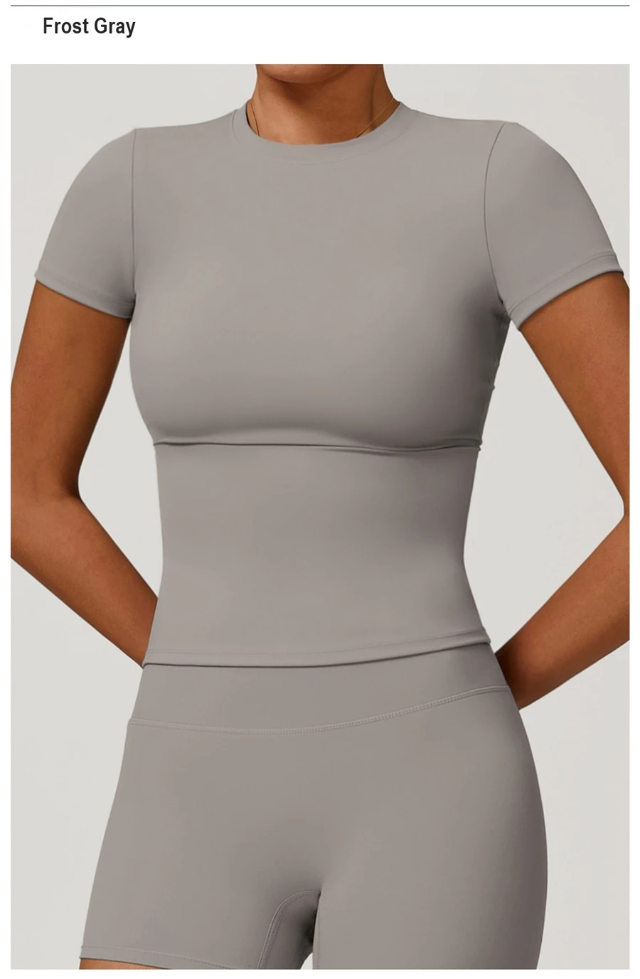 Women’s quick-dry yoga short sleeve tee in brushed nylon-spandex, slim-fit activewear top with classic crew neck and extended hem-gray