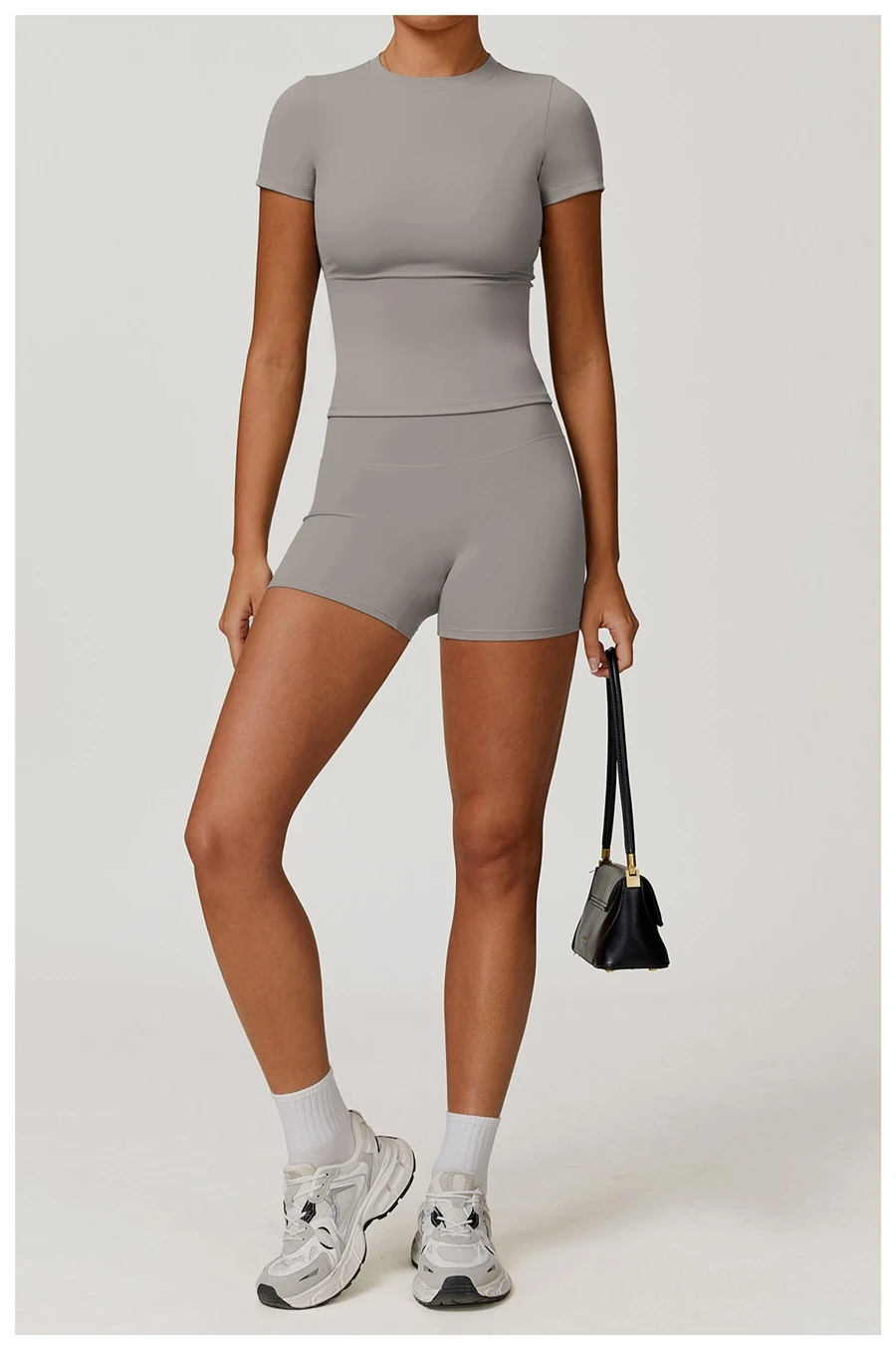Women’s quick-dry yoga short sleeve tee in brushed nylon-spandex, slim-fit activewear top with classic crew neck and extended hem-gray