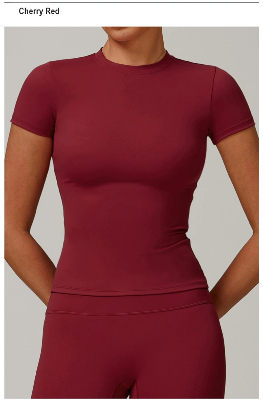 Women’s quick-dry yoga short sleeve tee in brushed nylon-spandex, slim-fit activewear top with classic crew neck and extended hem-cherry red