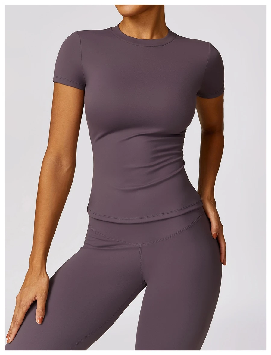 Women’s quick-dry yoga short sleeve tee in brushed nylon-spandex, slim-fit activewear top with classic crew neck and extended hem