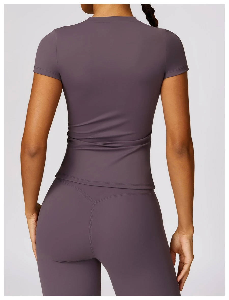 Women’s quick-dry yoga short sleeve tee in brushed nylon-spandex, slim-fit activewear top with classic crew neck and extended hem
