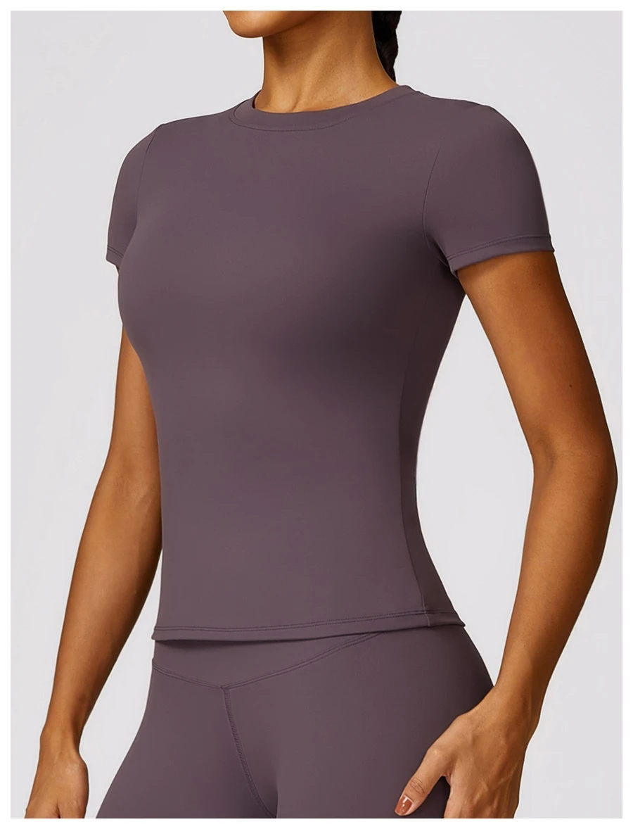 Women’s quick-dry yoga short sleeve tee in brushed nylon-spandex, slim-fit activewear top with classic crew neck and extended hem