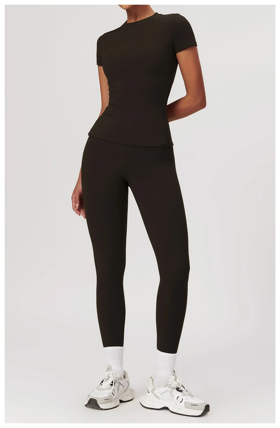 Women’s quick-dry yoga short sleeve tee in brushed nylon-spandex, slim-fit activewear top with classic crew neck and extended hem