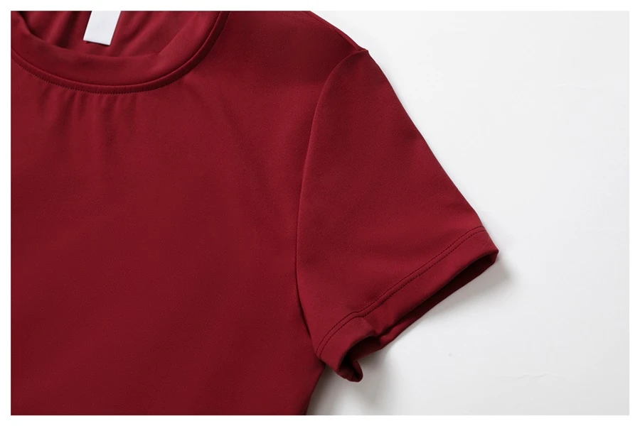 Women’s quick-dry yoga short sleeve tee in brushed nylon-spandex, slim-fit activewear top with classic crew neck and extended hem-actual close up
