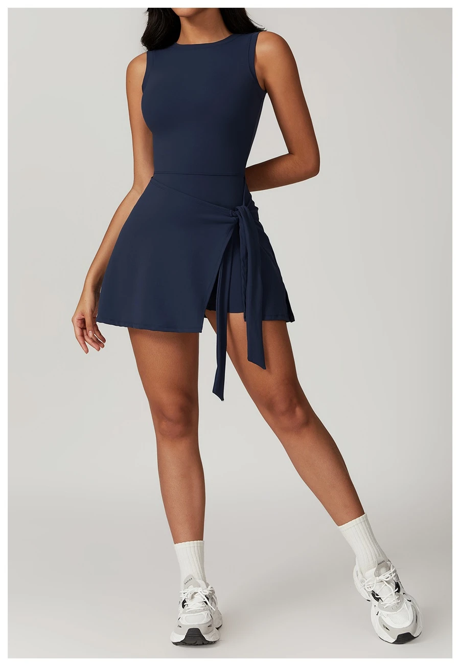U back tennis dress for women in dark blue, featuring sleeveless neckline and A-line skirt silhouette