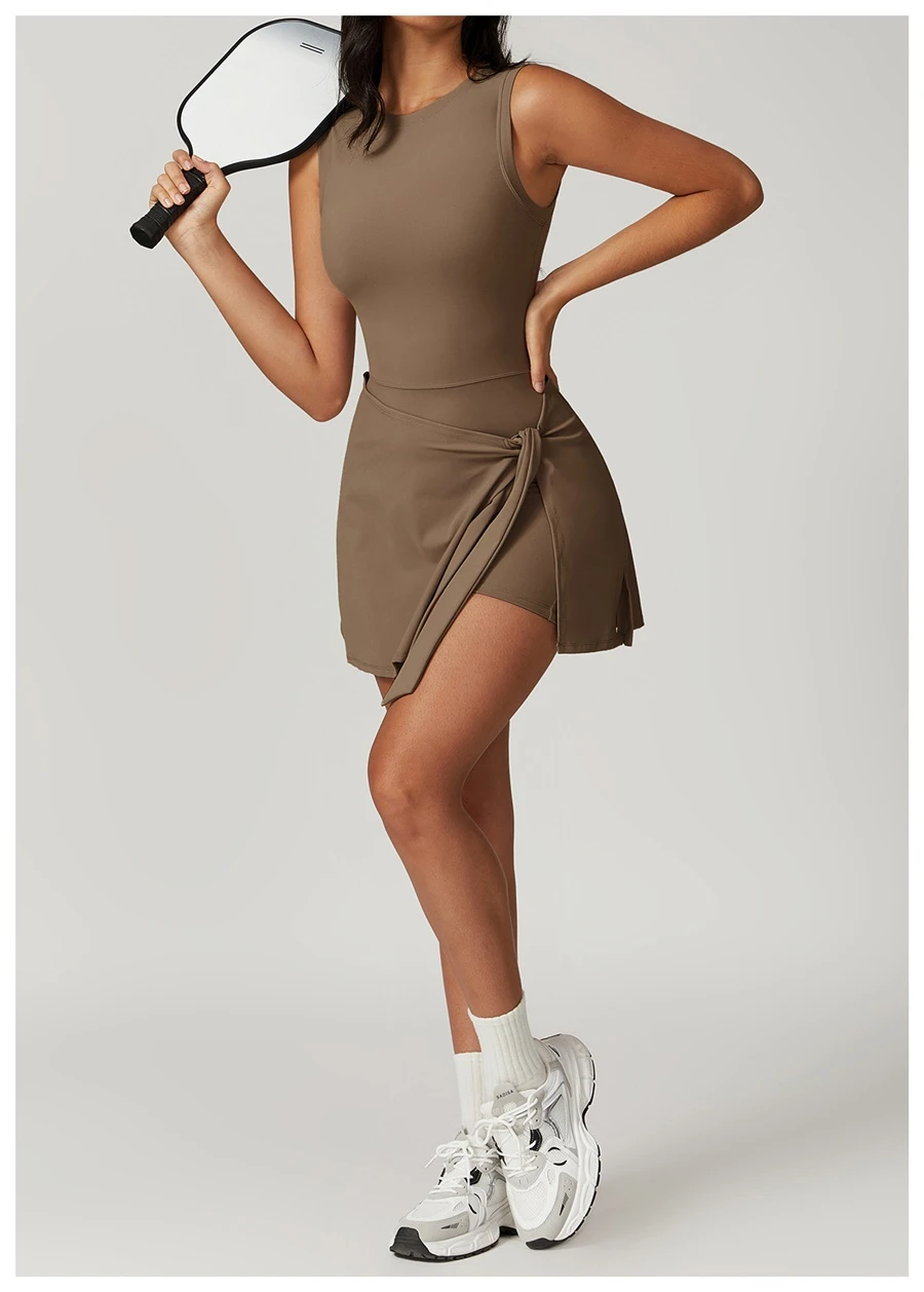 U back tennis dress for women in brown, featuring sleeveless neckline and A-line skirt silhouette