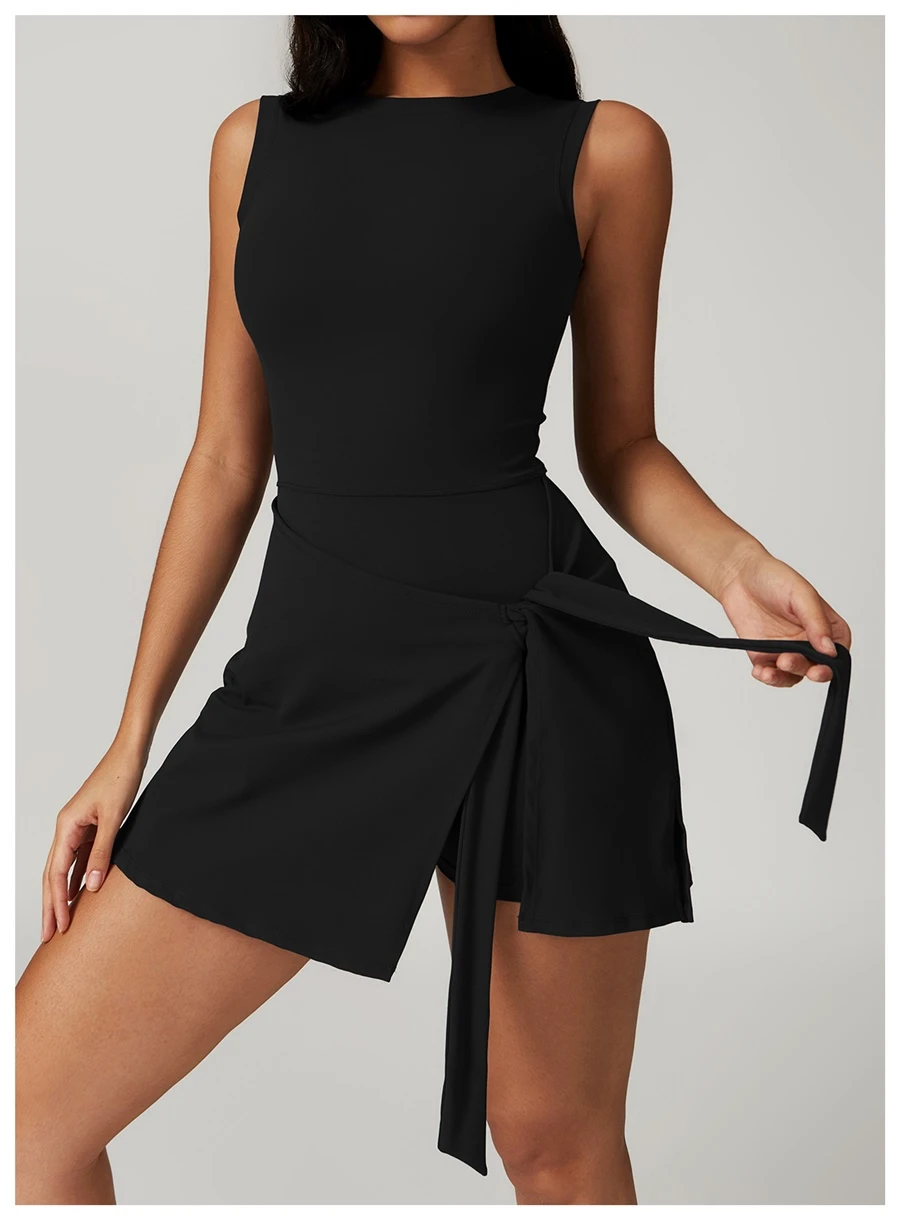 U back tennis dress for women in black, featuring sleeveless neckline and A-line skirt silhouette