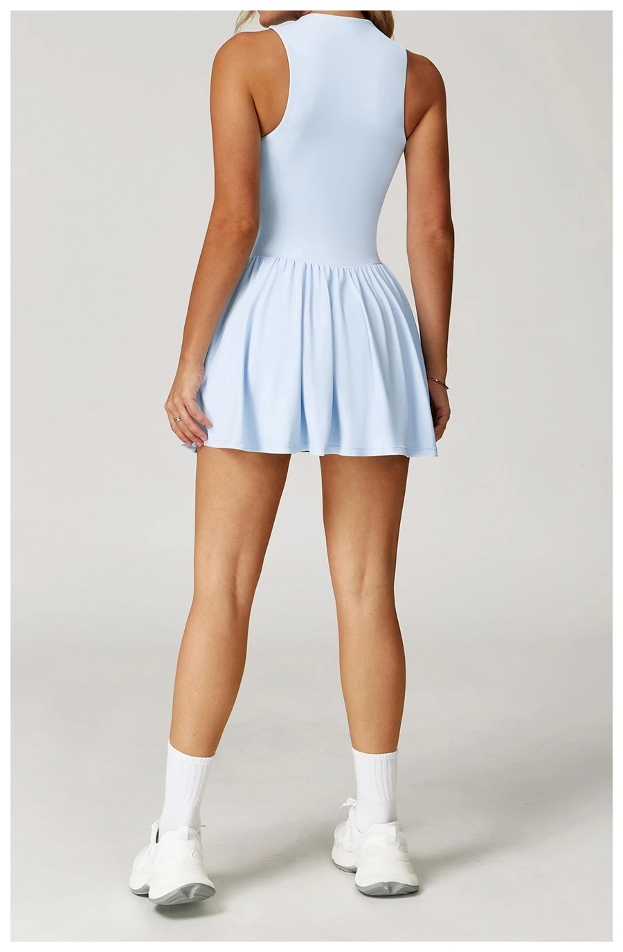 Back view of women's A-line sports dress showcasing the elegant fit and built-in shorts design
