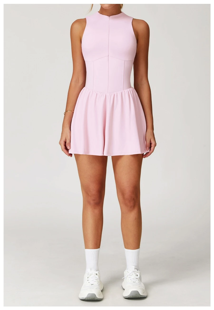2-in-1 A-line tennis dress for women in mousse pink, featuring half-zip mock neck and flattering A-line silhouette