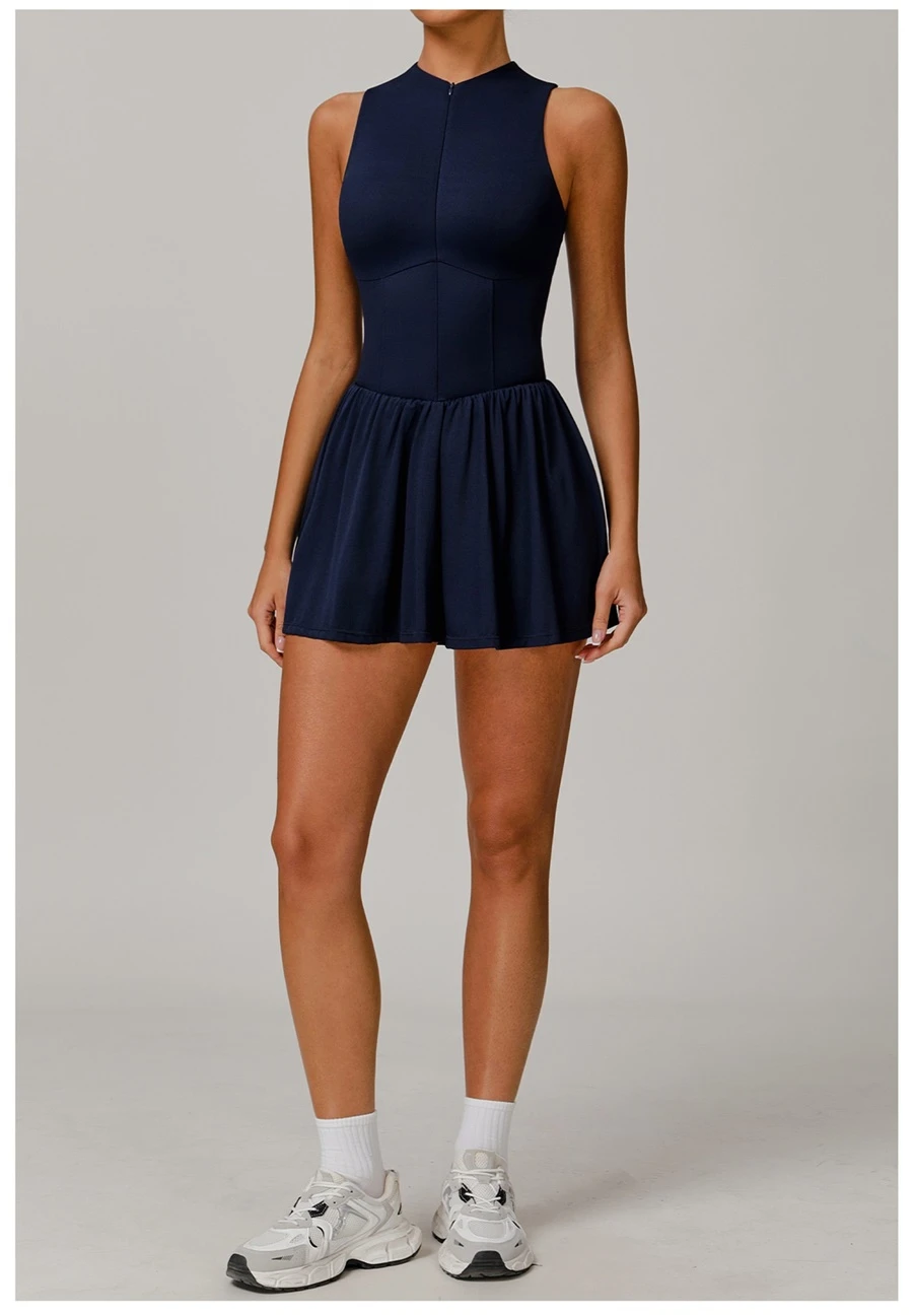 2-in-1 A-line tennis dress for women in insignia blue, featuring half-zip mock neck and flattering A-line silhouette