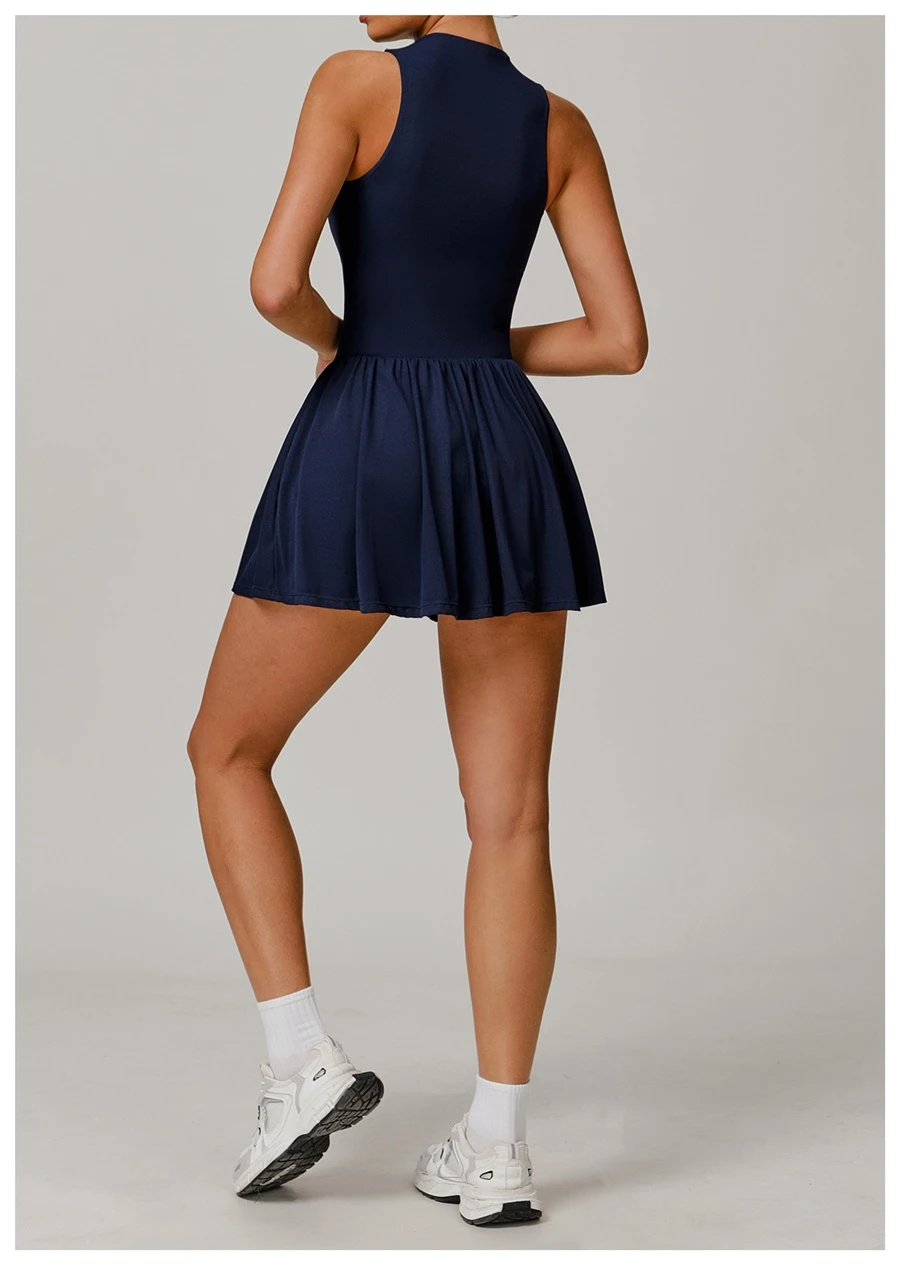 2-in-1 A-line tennis dress for women in insignia blue back, featuring half-zip mock neck and flattering A-line silhouette