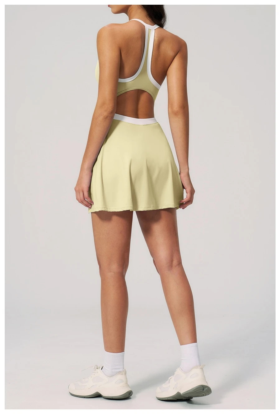 Women's open back workout dress highlighting breathable design-yellow