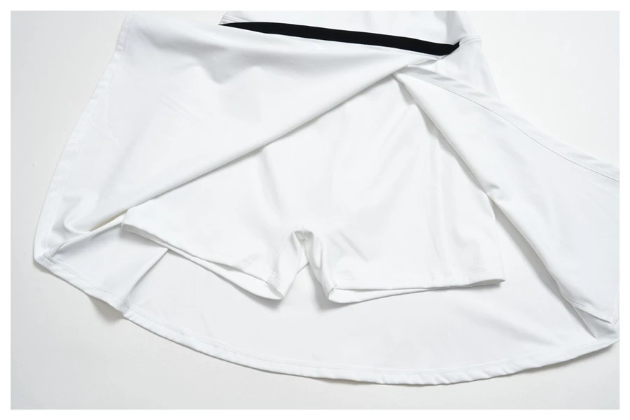 Women's activewear dress with built-in safety shorts for sports