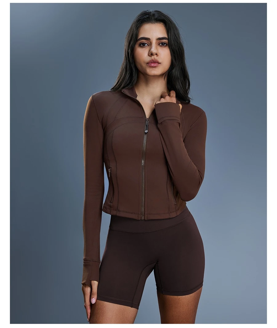 Slim fit women's yoga jacket with waist shaping panel design