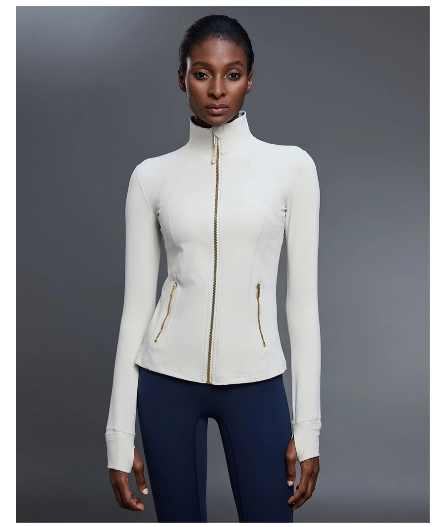 Fitted activewear jacket with thumb hole cuffs and zipper pockets-white