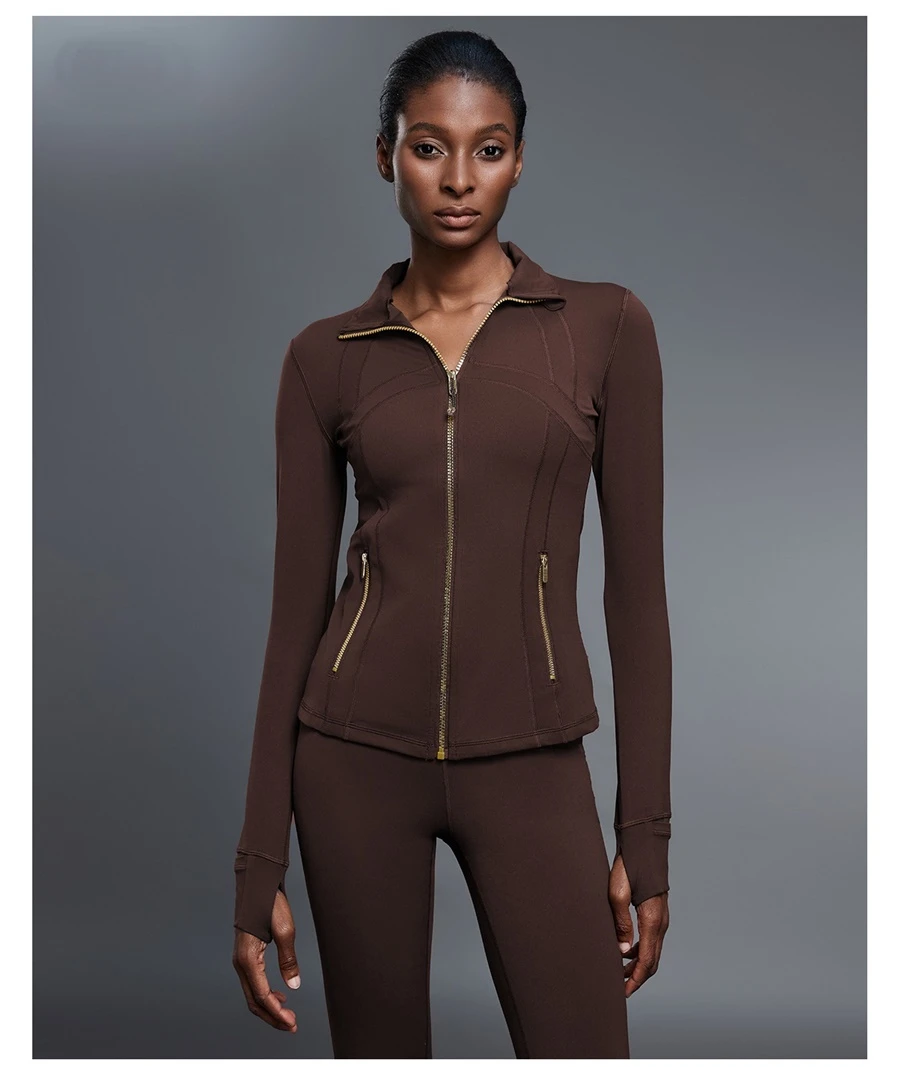 Fitted activewear jacket with thumb hole cuffs and zipper pockets-coffee