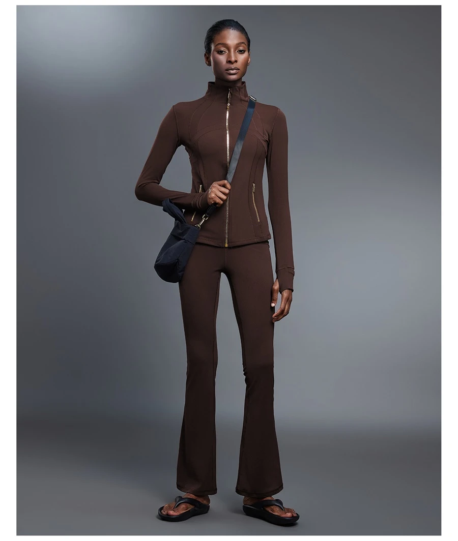 Women's long sleeve workout jacket with high collar and slim fit design