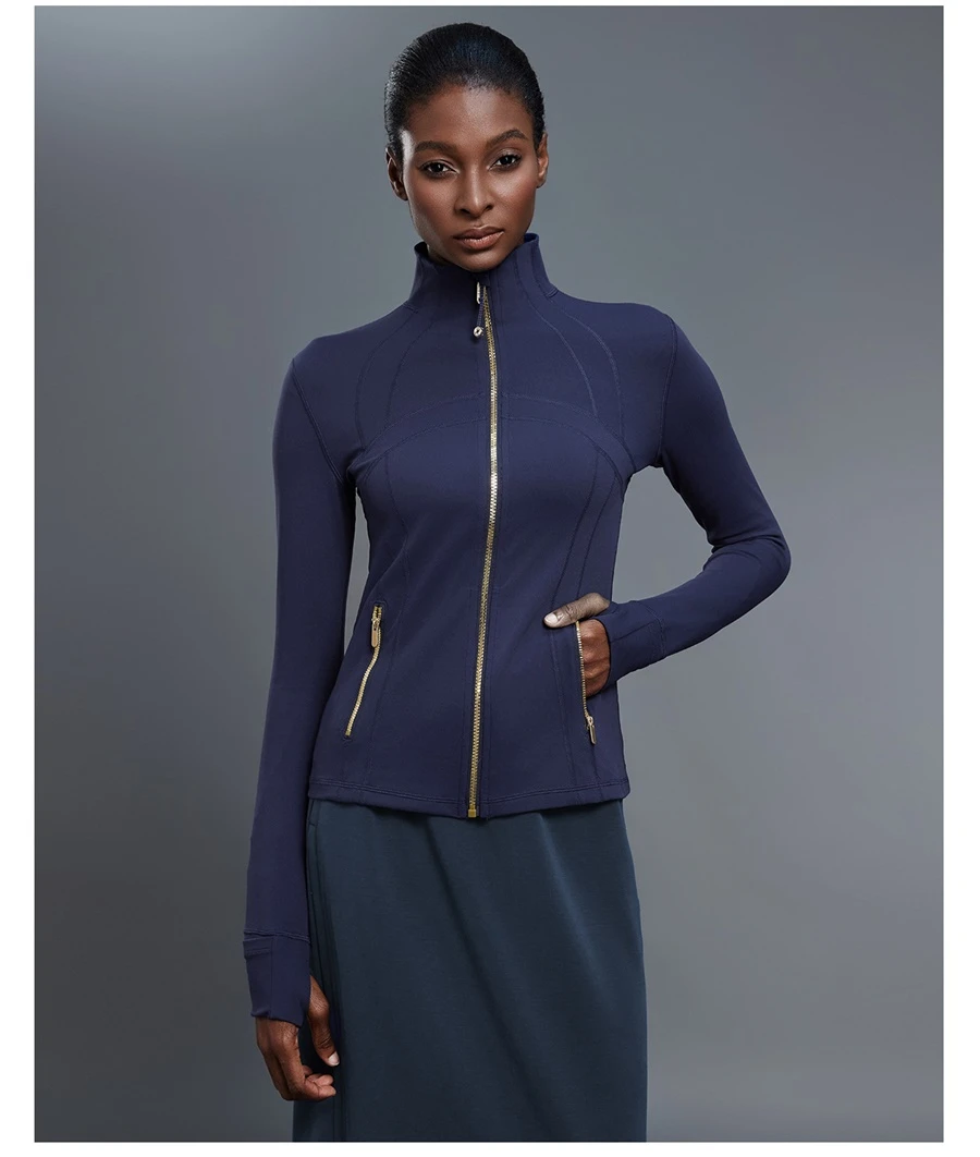 Fitted activewear jacket with thumb hole cuffs and zipper pockets-navy