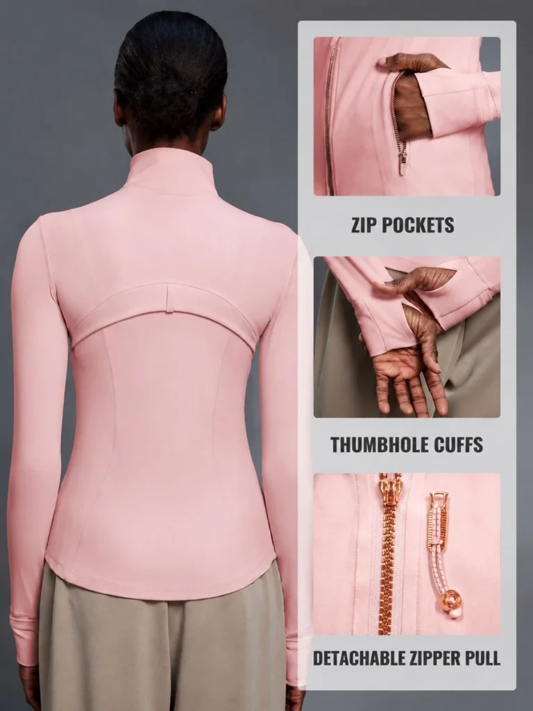 Fitted activewear jacket with thumb hole cuffs and zipper pockets