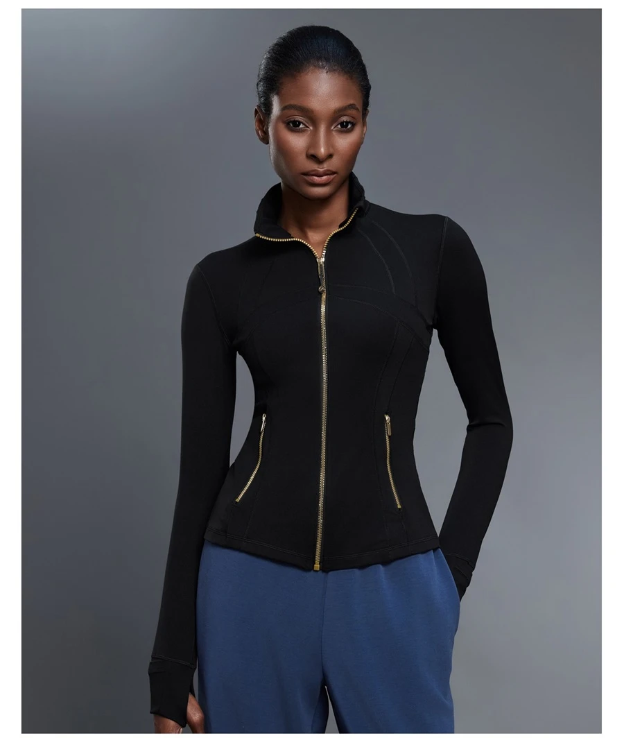 Fitted activewear jacket with thumb hole cuffs and zipper pockets-black