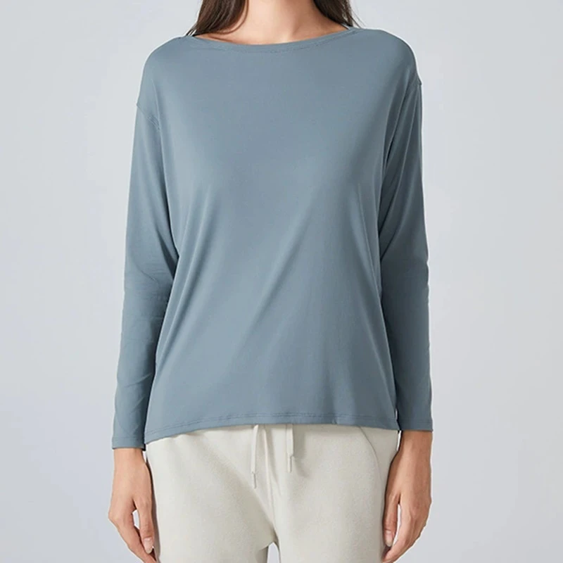 Women's loose fit long sleeve yoga top with brushed fabric for workout and yoga
