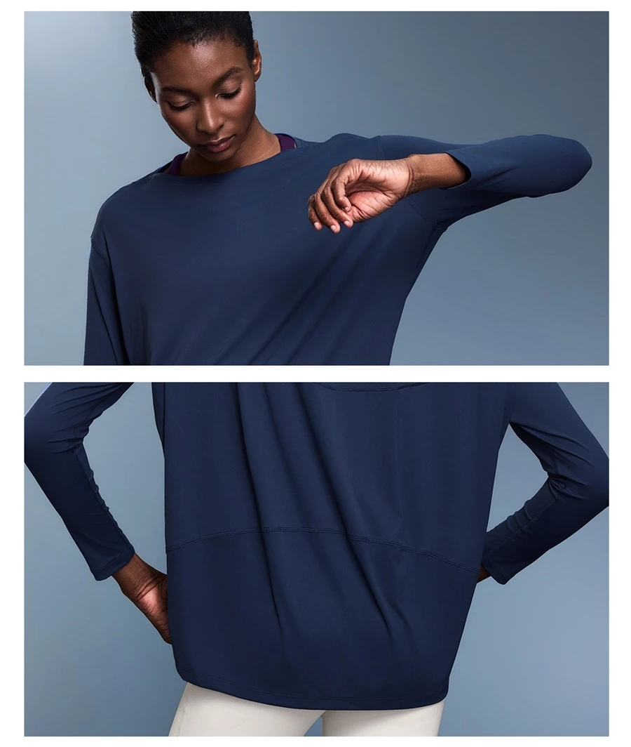 Relaxed fit yoga top with front short back long curved hem design