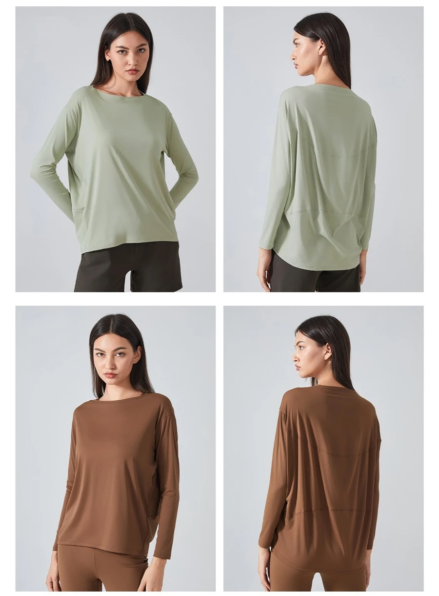 Relaxed fit yoga top with front short back long curved hem design