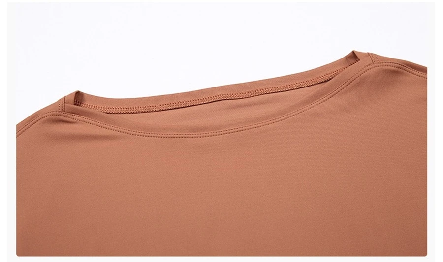 Women's long sleeve workout shirt with wide neckline and dropped shoulder design