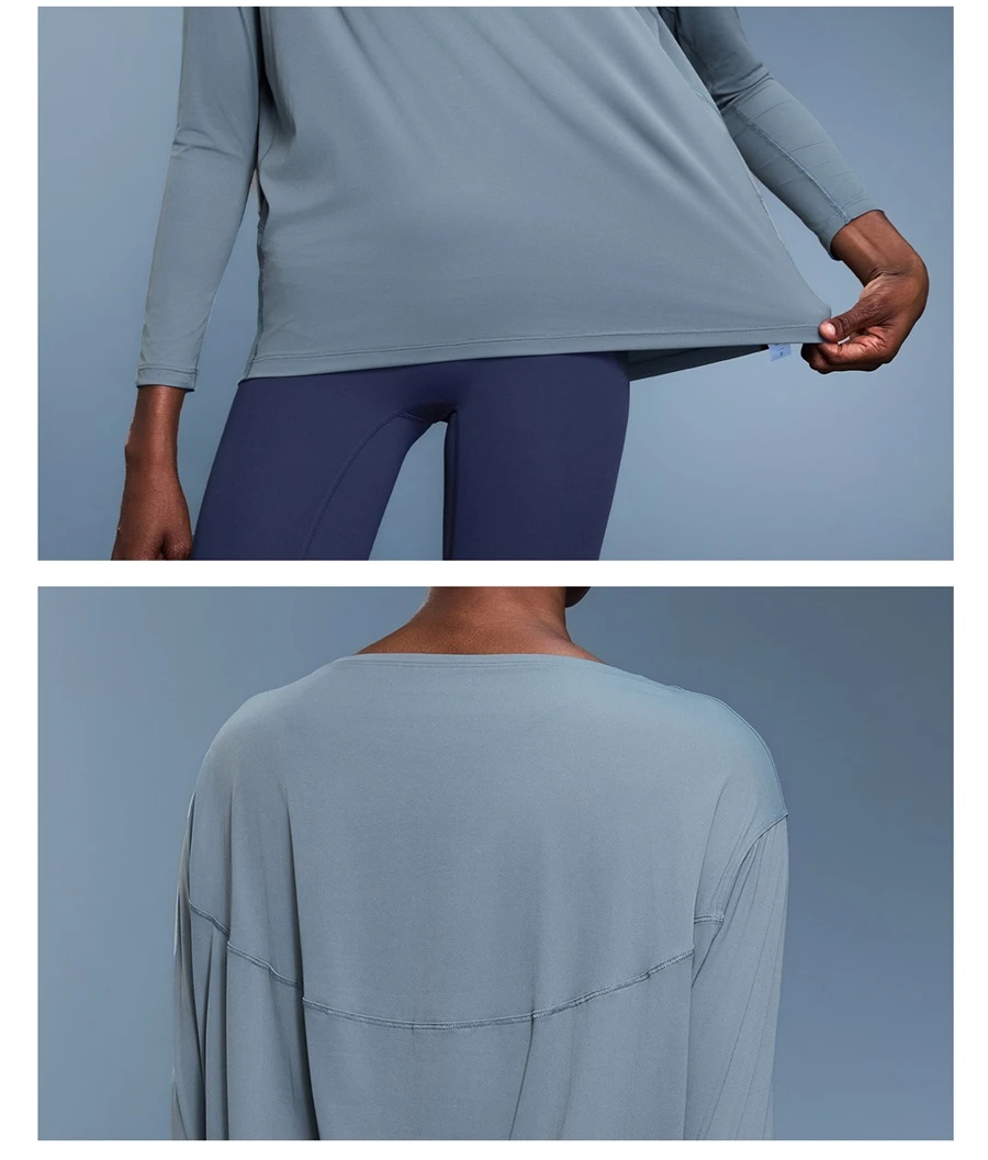 Relaxed fit yoga top with front short back long curved hem design-blue