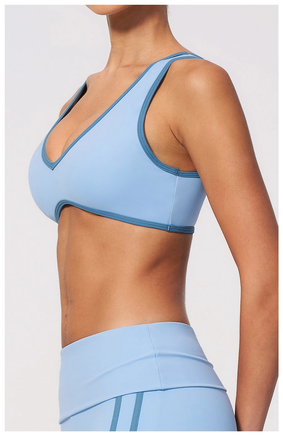 Side View for Women's breathable open-back workout bra for fitness-light blue