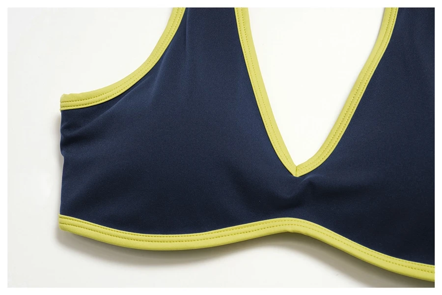 Women's V-neck yoga sports bra highlighting the collarbone